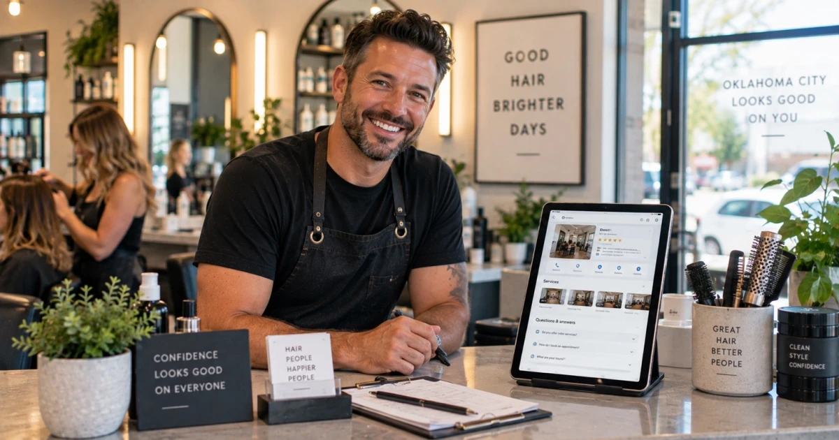 A smiling Oklahoma salon owner reviewing answer engine visibility, local business details, reviews, hours, services, and FAQs from a front desk